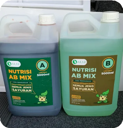 Two jerrycans labelled Nutrisi AB Mix A and B with the Akar logo